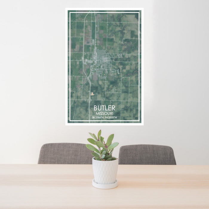 24x36 Butler Missouri Map Print Portrait Orientation in Afternoon Style Behind 2 Chairs Table and Potted Plant