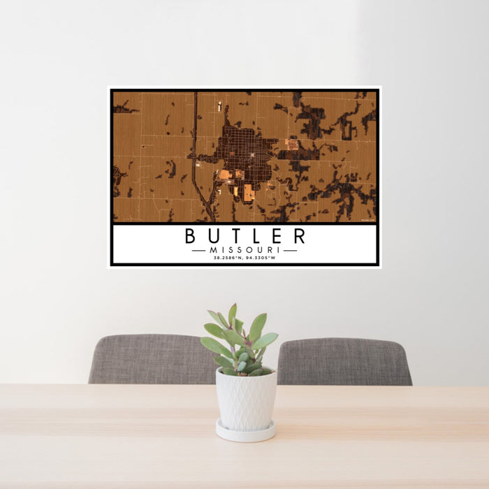 24x36 Butler Missouri Map Print Lanscape Orientation in Ember Style Behind 2 Chairs Table and Potted Plant