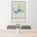 24x36 Caddo lake Louisiana Map Print Portrait Orientation in Woodblock Style Behind 2 Chairs Table and Potted Plant