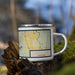 Right View Custom Caddo lake Louisiana Map Enamel Mug in Woodblock on Grass With Trees in Background