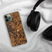 Custom Cadiz Kentucky Map Phone Case in Ember on Table with Black Headphones