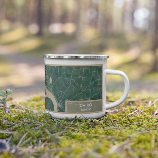 Right View Custom Cairo Illinois Map Enamel Mug in Afternoon on Grass With Trees in Background