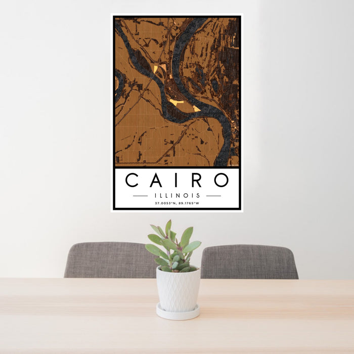 24x36 Cairo Illinois Map Print Portrait Orientation in Ember Style Behind 2 Chairs Table and Potted Plant