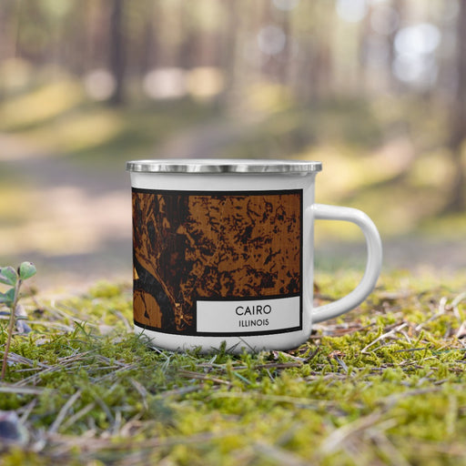 Right View Custom Cairo Illinois Map Enamel Mug in Ember on Grass With Trees in Background