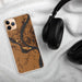 Custom Cairo Illinois Map Phone Case in Ember on Table with Black Headphones