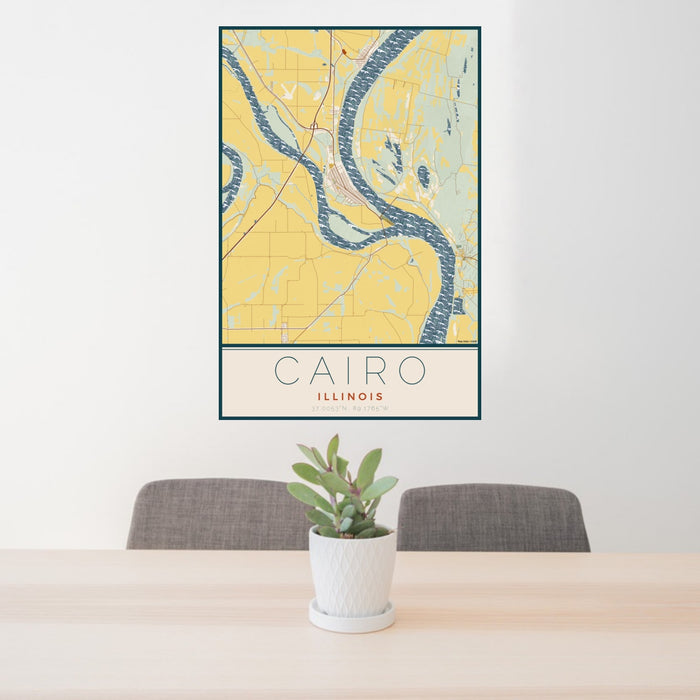 24x36 Cairo Illinois Map Print Portrait Orientation in Woodblock Style Behind 2 Chairs Table and Potted Plant