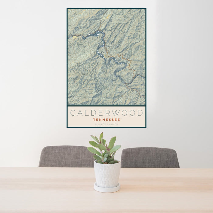 24x36 Calderwood Tennessee Map Print Portrait Orientation in Woodblock Style Behind 2 Chairs Table and Potted Plant
