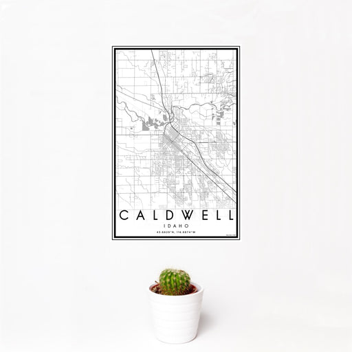 12x18 Caldwell Idaho Map Print Portrait Orientation in Classic Style With Small Cactus Plant in White Planter