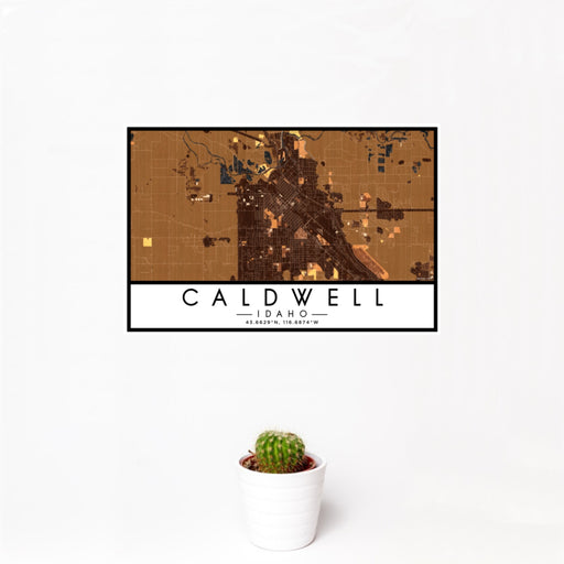 12x18 Caldwell Idaho Map Print Landscape Orientation in Ember Style With Small Cactus Plant in White Planter