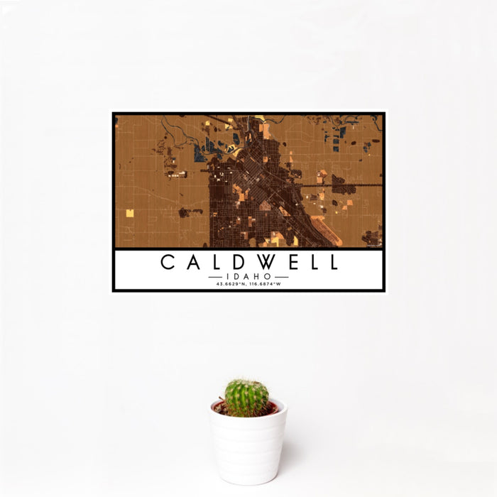 12x18 Caldwell Idaho Map Print Landscape Orientation in Ember Style With Small Cactus Plant in White Planter