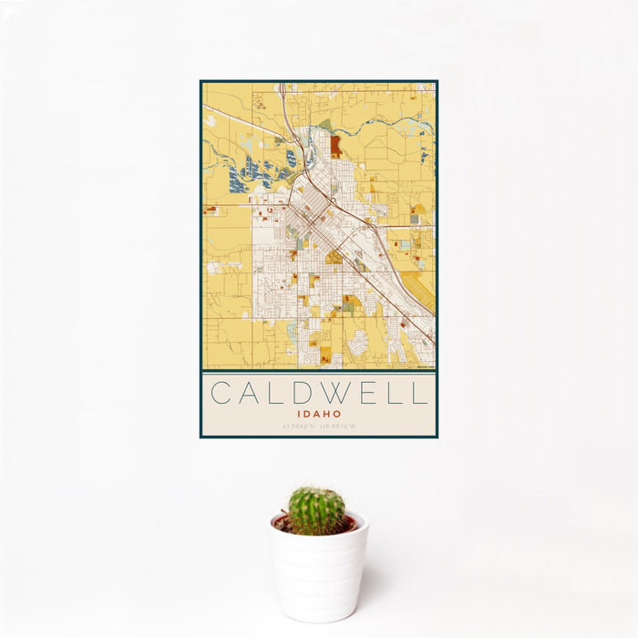 12x18 Caldwell Idaho Map Print Portrait Orientation in Woodblock Style With Small Cactus Plant in White Planter