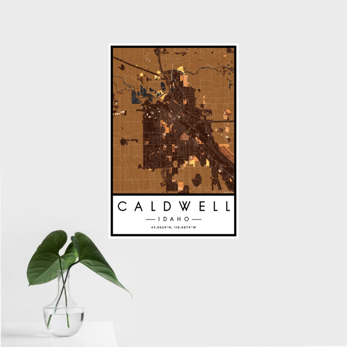16x24 Caldwell Idaho Map Print Portrait Orientation in Ember Style With Tropical Plant Leaves in Water