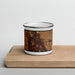 Front View Custom Caldwell Idaho Map Enamel Mug in Ember on Cutting Board