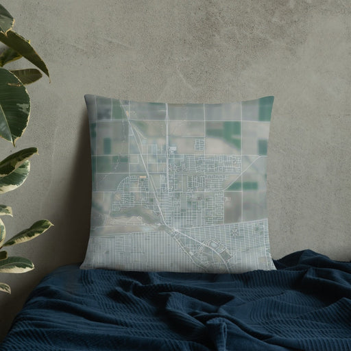 Custom Calexico California Map Throw Pillow in Afternoon on Bedding Against Wall