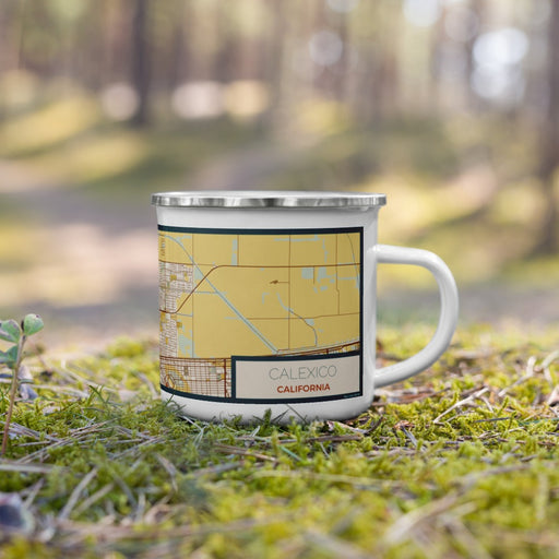 Right View Custom Calexico California Map Enamel Mug in Woodblock on Grass With Trees in Background