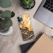 Custom Calistoga California Map Phone Case in Ember on Table with Laptop and Plant