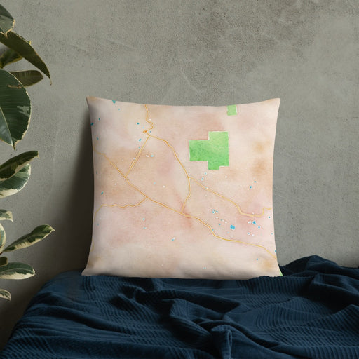 Custom Calistoga California Map Throw Pillow in Watercolor on Bedding Against Wall