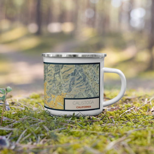 Right View Custom Calistoga California Map Enamel Mug in Woodblock on Grass With Trees in Background