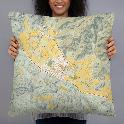 Person holding 22x22 Custom Calistoga California Map Throw Pillow in Woodblock