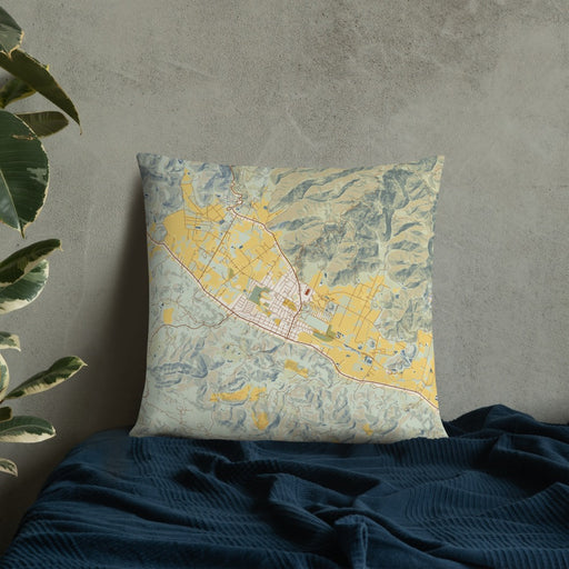 Custom Calistoga California Map Throw Pillow in Woodblock on Bedding Against Wall