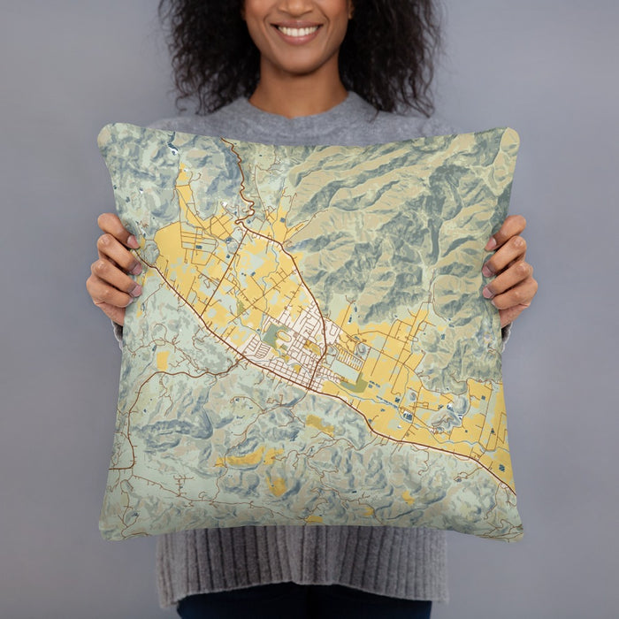 Person holding 18x18 Custom Calistoga California Map Throw Pillow in Woodblock