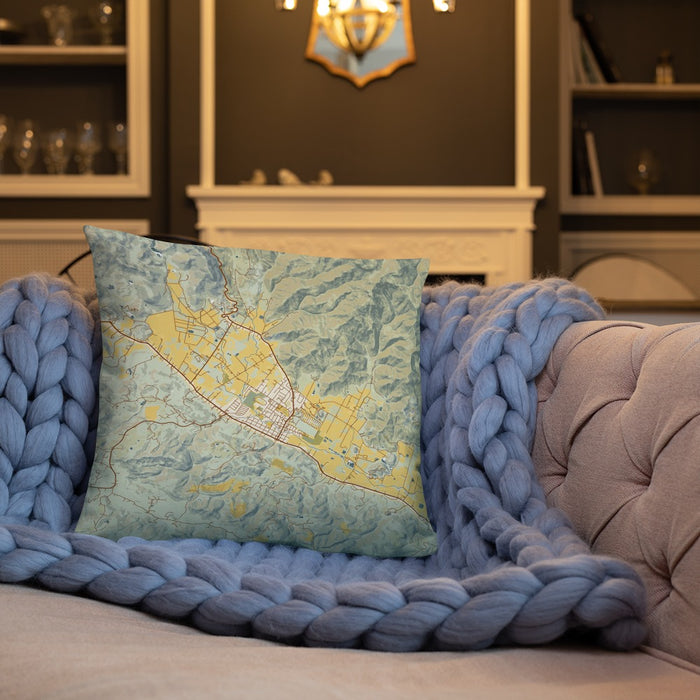 Custom Calistoga California Map Throw Pillow in Woodblock on Cream Colored Couch