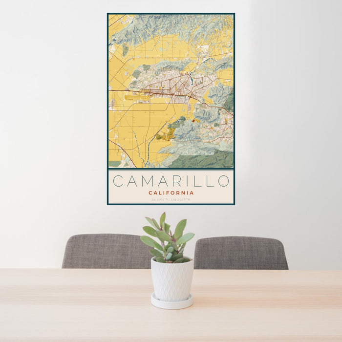 24x36 Camarillo California Map Print Portrait Orientation in Woodblock Style Behind 2 Chairs Table and Potted Plant