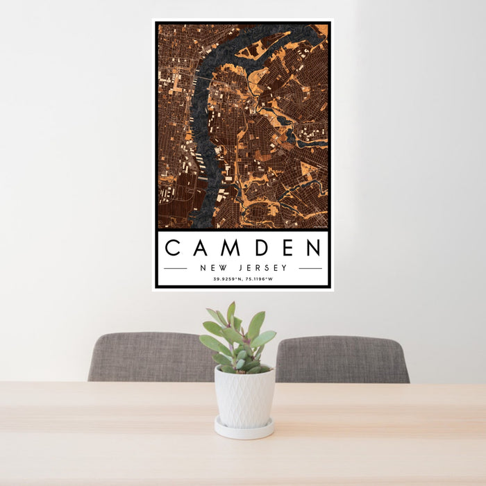 24x36 Camden New Jersey Map Print Portrait Orientation in Ember Style Behind 2 Chairs Table and Potted Plant