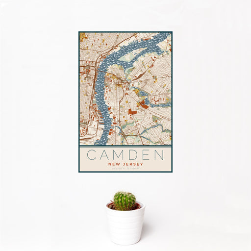12x18 Camden New Jersey Map Print Portrait Orientation in Woodblock Style With Small Cactus Plant in White Planter