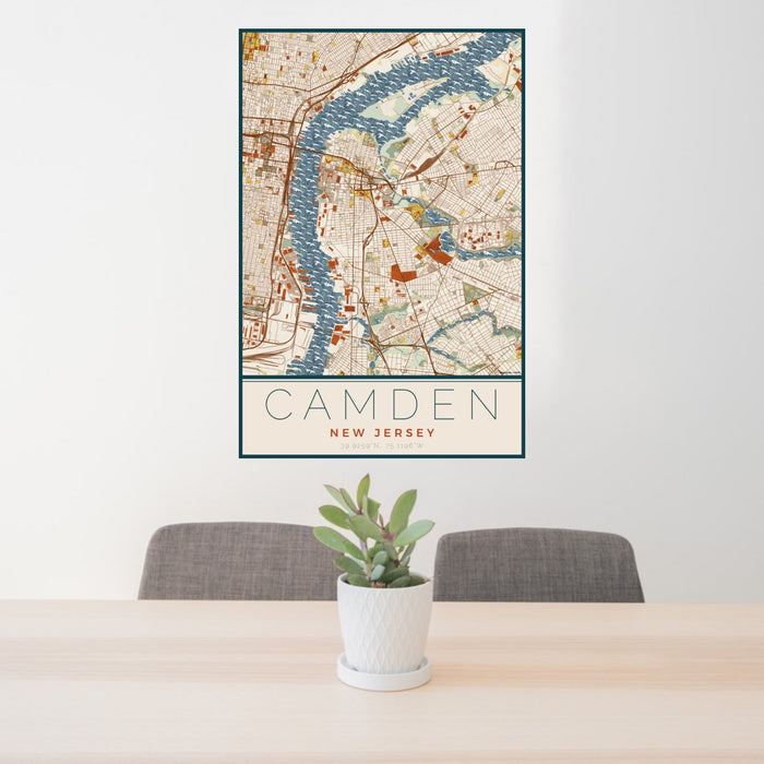 24x36 Camden New Jersey Map Print Portrait Orientation in Woodblock Style Behind 2 Chairs Table and Potted Plant