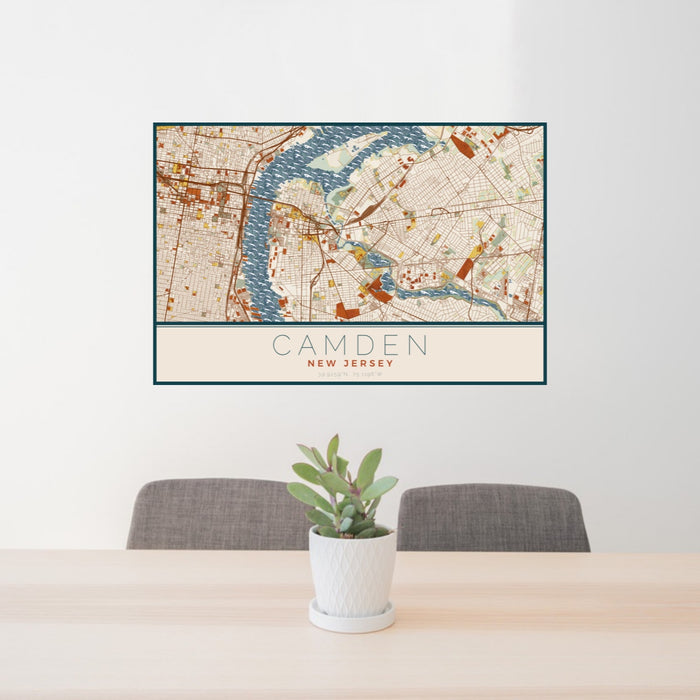 24x36 Camden New Jersey Map Print Landscape Orientation in Woodblock Style Behind 2 Chairs Table and Potted Plant