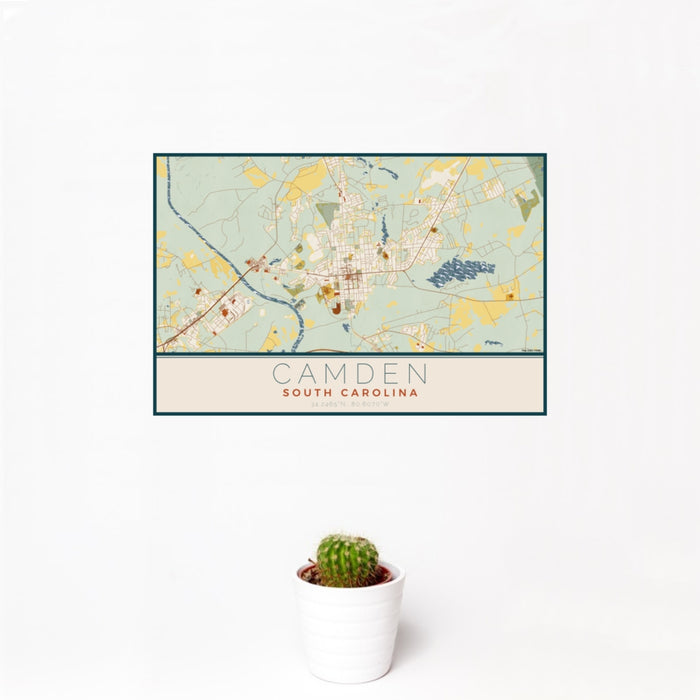 12x18 Camden South Carolina Map Print Landscape Orientation in Woodblock Style With Small Cactus Plant in White Planter