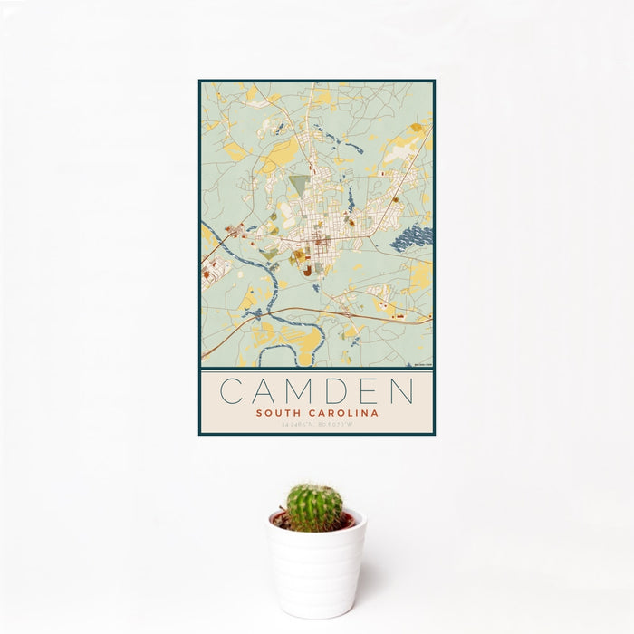 12x18 Camden South Carolina Map Print Portrait Orientation in Woodblock Style With Small Cactus Plant in White Planter