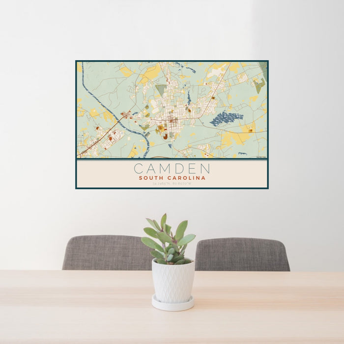 24x36 Camden South Carolina Map Print Lanscape Orientation in Woodblock Style Behind 2 Chairs Table and Potted Plant