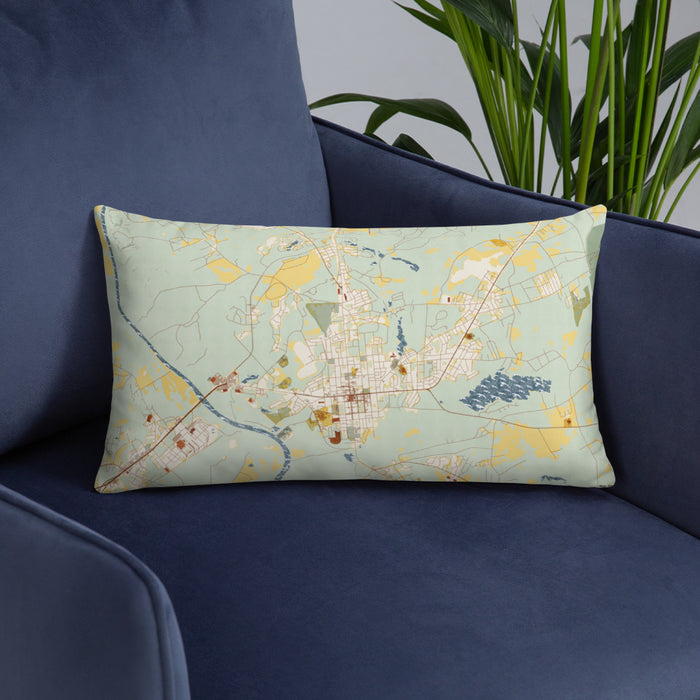 Custom Camden South Carolina Map Throw Pillow in Woodblock on Blue Colored Chair