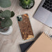Custom Campbell California Map Phone Case in Ember on Table with Laptop and Plant