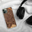 Custom Campbell California Map Phone Case in Ember on Table with Black Headphones