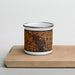 Front View Custom Canandaigua New York Map Enamel Mug in Ember on Cutting Board
