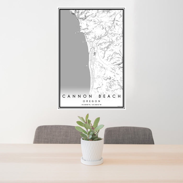 24x36 Cannon Beach Oregon Map Print Portrait Orientation in Classic Style Behind 2 Chairs Table and Potted Plant