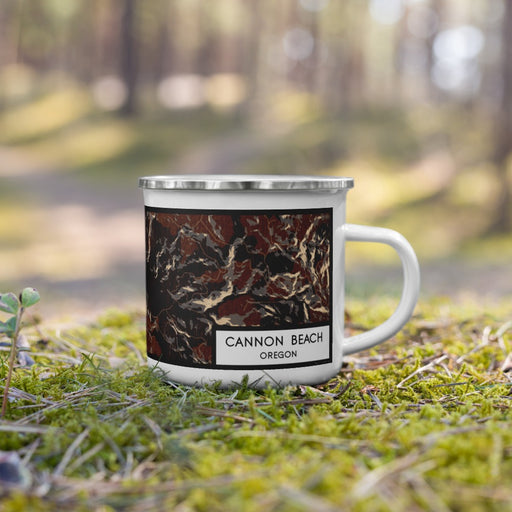 Right View Custom Cannon Beach Oregon Map Enamel Mug in Ember on Grass With Trees in Background