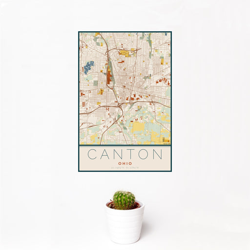 12x18 Canton Ohio Map Print Portrait Orientation in Woodblock Style With Small Cactus Plant in White Planter