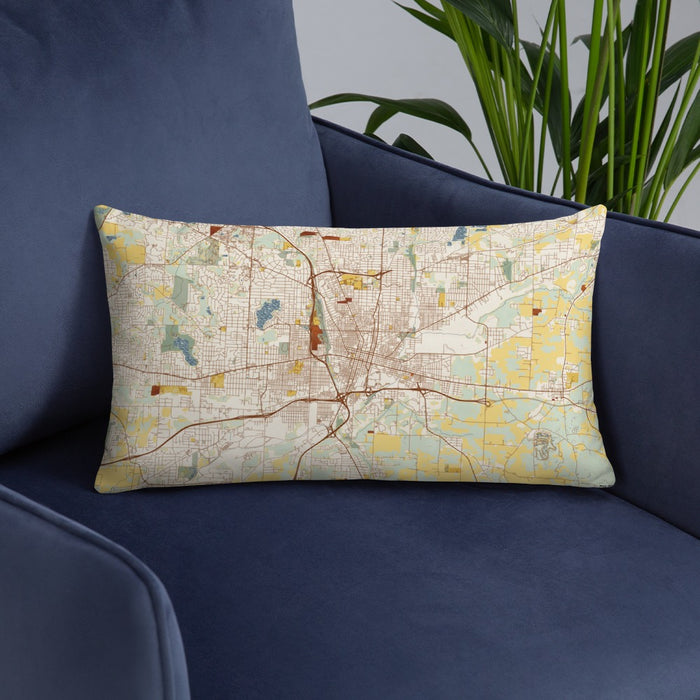 Custom Canton Ohio Map Throw Pillow in Woodblock on Blue Colored Chair