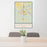24x36 Canyon Texas Map Print Portrait Orientation in Woodblock Style Behind 2 Chairs Table and Potted Plant