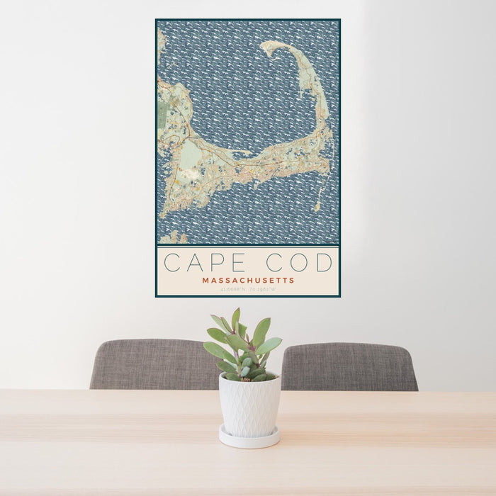 24x36 Cape Cod Massachusetts Map Print Portrait Orientation in Woodblock Style Behind 2 Chairs Table and Potted Plant