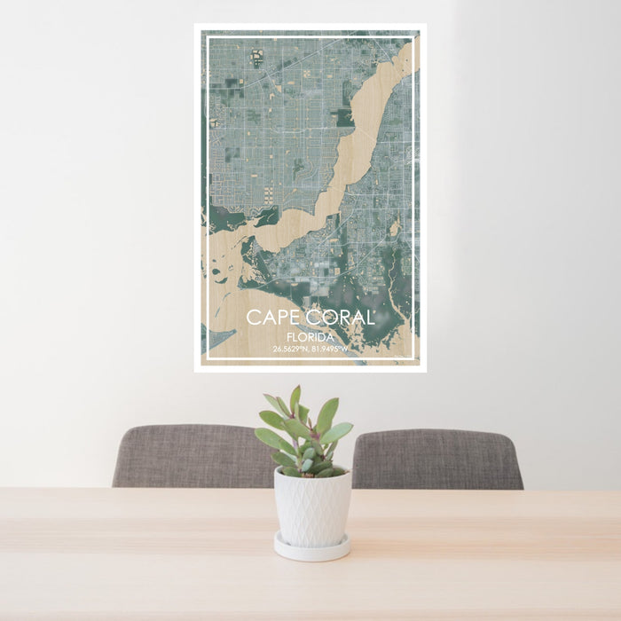 24x36 Cape Coral Florida Map Print Portrait Orientation in Afternoon Style Behind 2 Chairs Table and Potted Plant