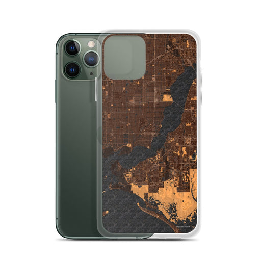 Custom Cape Coral Florida Map Phone Case in Ember on Table with Laptop and Plant