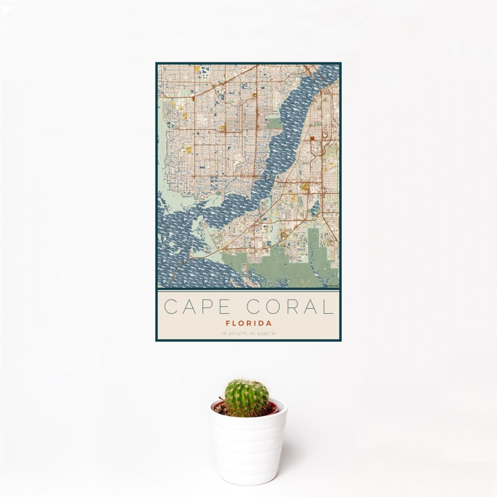 12x18 Cape Coral Florida Map Print Portrait Orientation in Woodblock Style With Small Cactus Plant in White Planter