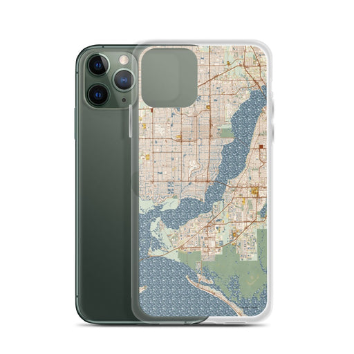 Custom Cape Coral Florida Map Phone Case in Woodblock on Table with Laptop and Plant