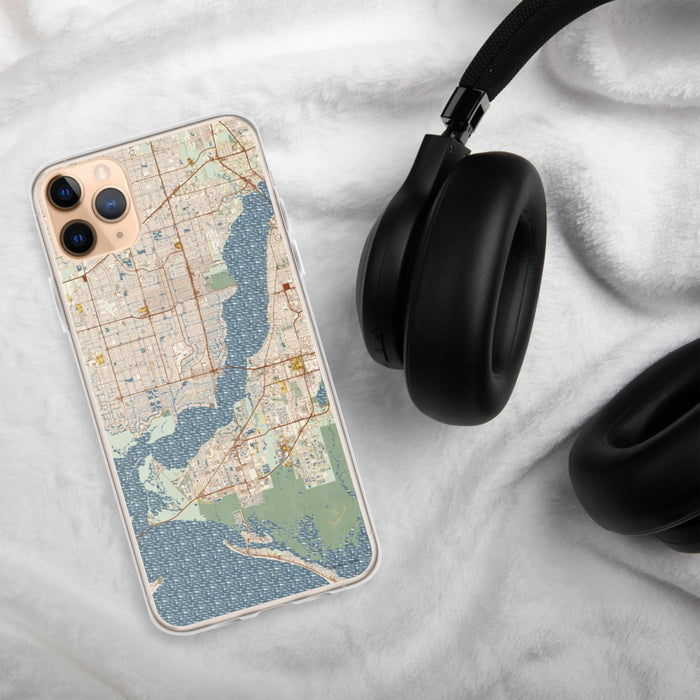 Custom Cape Coral Florida Map Phone Case in Woodblock on Table with Black Headphones