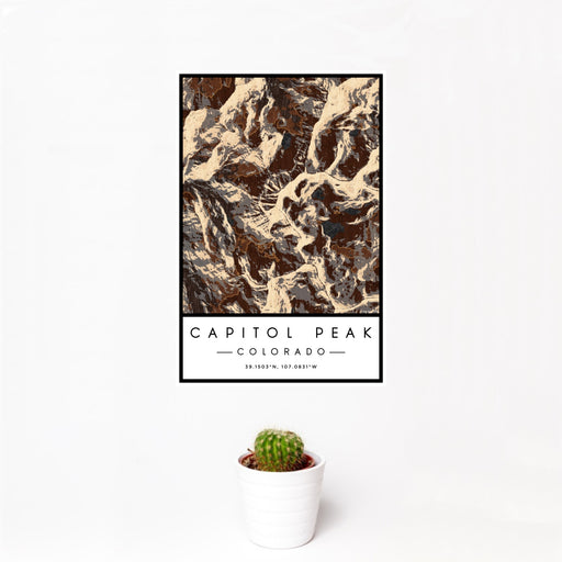 12x18 Capitol Peak Colorado Map Print Portrait Orientation in Ember Style With Small Cactus Plant in White Planter